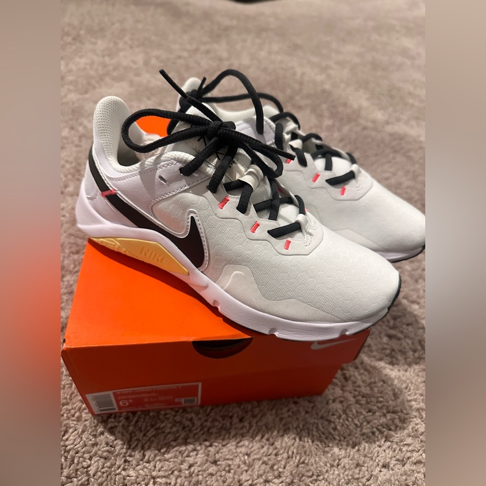 Nike Women’s White Sneakers with Black and Pink Accents